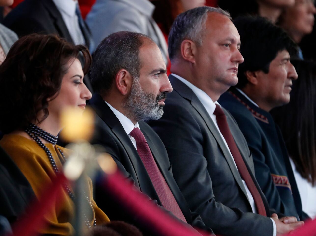 Armenian Prime Minister Nikol Pashinyan (2L), Moldovan President Igor Dodon (2R) and Bolivian President Evo Morales (R) attend a gala-concert dedicated to the Russia 2018 World Cup football tournament at Red Square in Moscow on June 13, 2018. / AFP PHOTO / POOL / SERGEI CHIRIKOVSERGEI CHIRIKOV/AFP/Getty Images ** OUTS - ELSENT, FPG, CM - OUTS * NM, PH, VA if sourced by CT, LA or MoD **