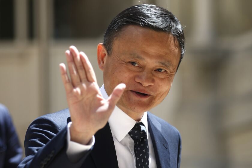 FILE - Founder of Alibaba group Jack Ma arrives for the Tech for Good summit in Paris on May 15, 2019. Alibaba founder Jack Ma has resurfaced in China after months of overseas travel, visiting a school in the city where his company is headquartered and discussed topics such as artificial intelligence. (AP Photo/Thibault Camus, File)