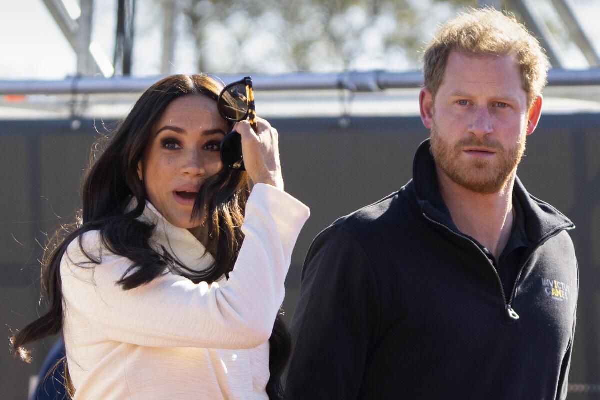 Meghan, Duchess of Sussex, and her husband, Prince Harry