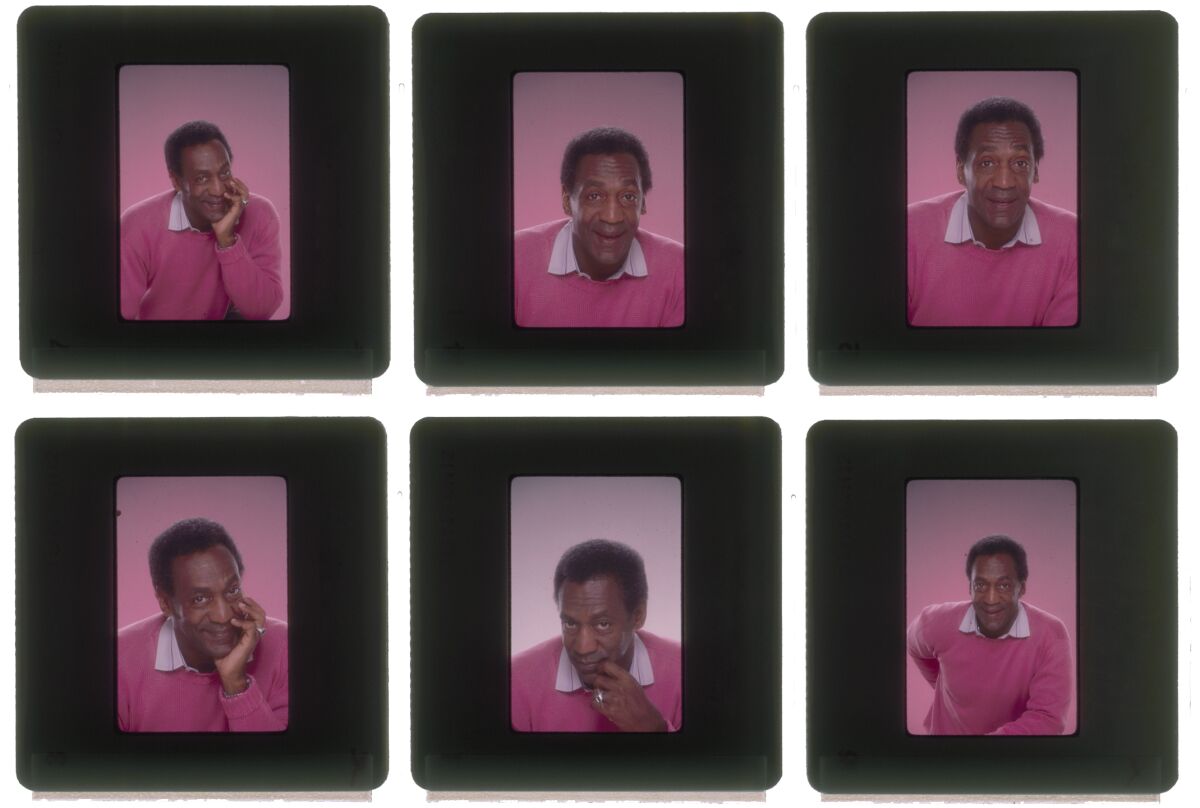 A panel of six photographs of Bill Cosby in a pink sweater making different faces