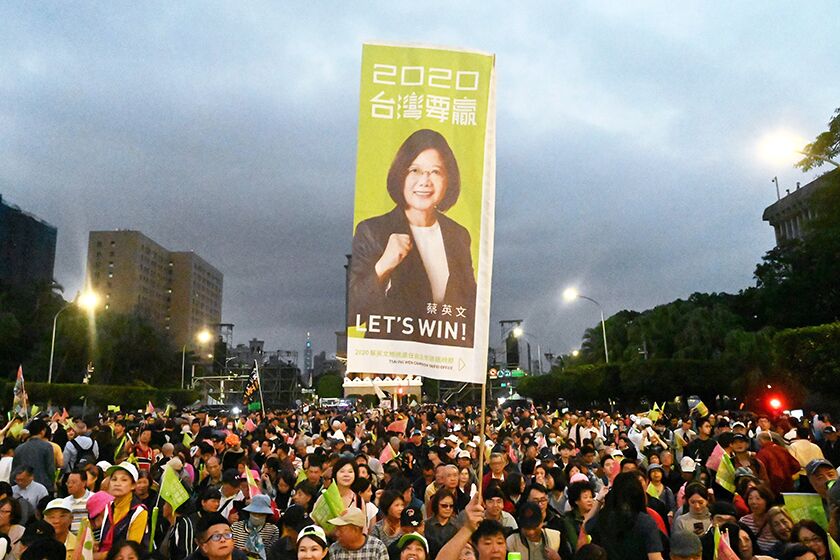 Supporters of Taiwan’s independence-leaning President Tsai Ing-wen hold a rally a rally in Taipei on Friday.