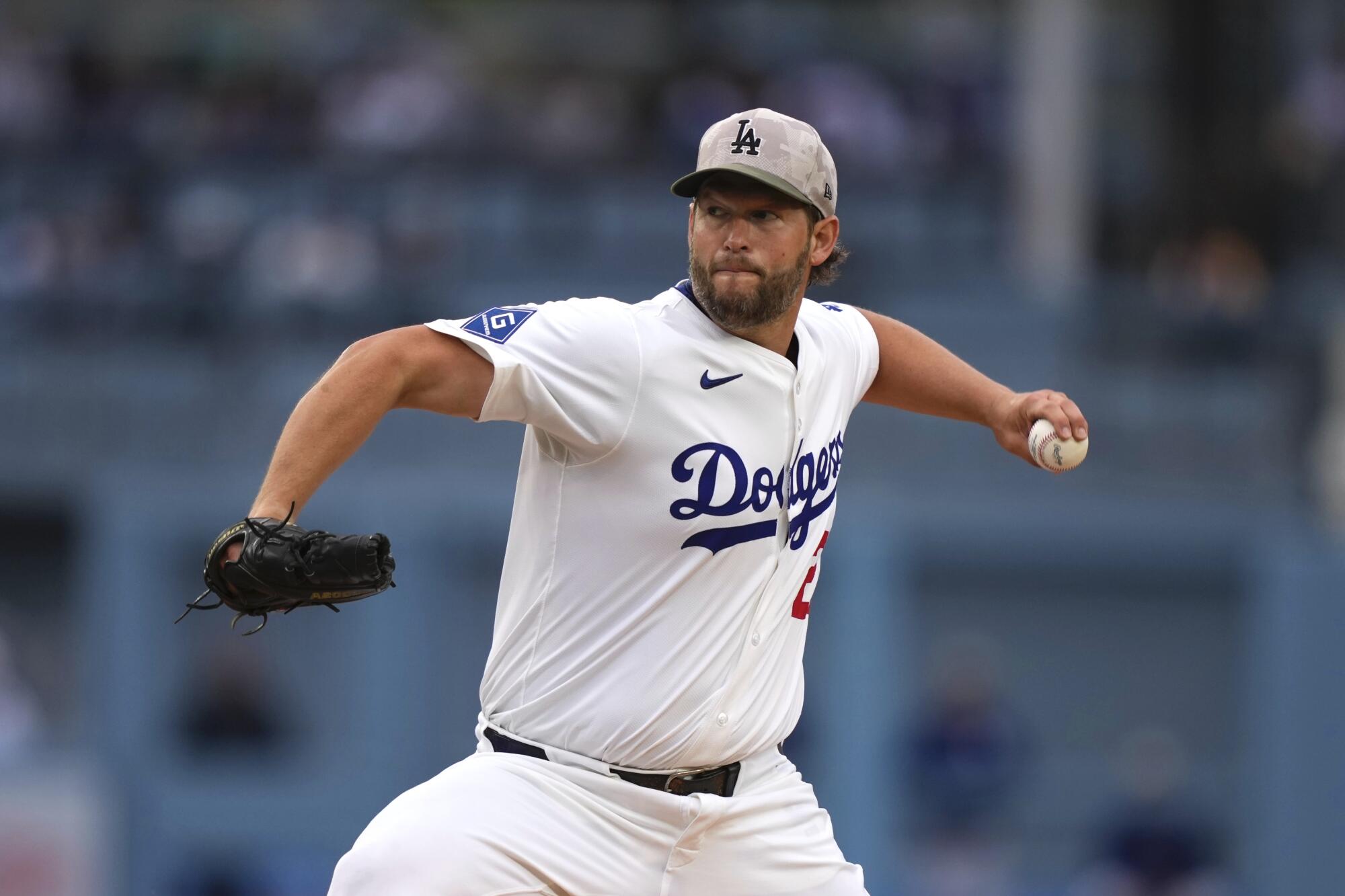 Los Angeles Dodgers starting pitcher Clayton Kershaw throws to the plate.
