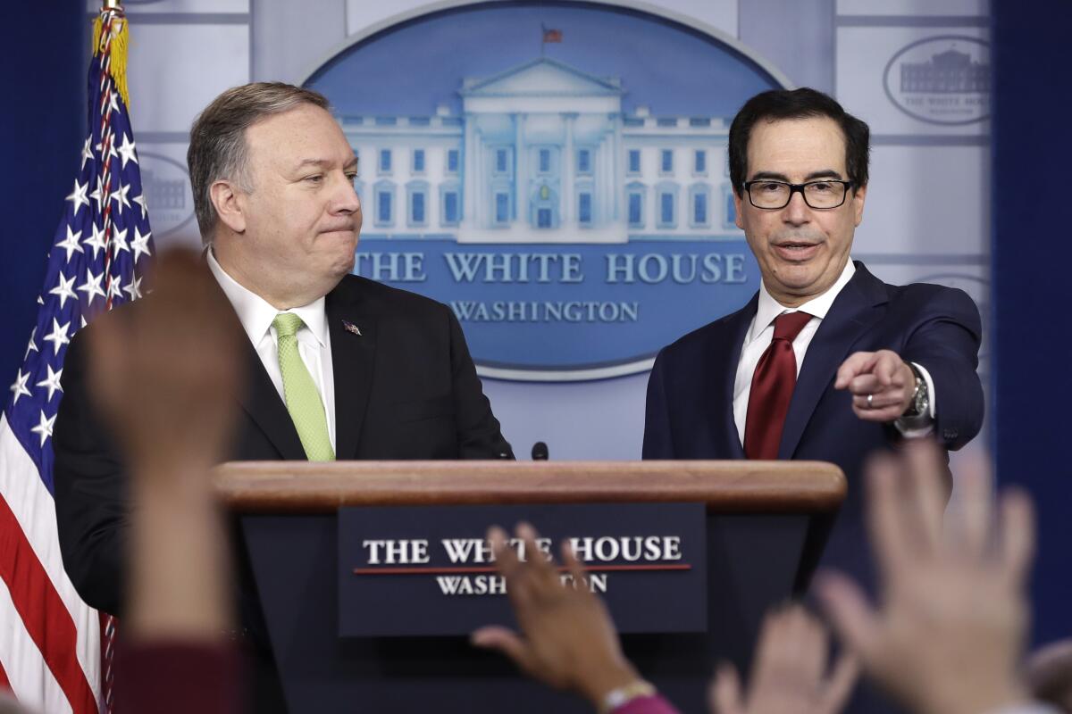 Secretary of State Mike Pompeo and Treasury Secretary Steve Mnuchin brief reporters about additional sanctions placed on Iran, at the White House, Friday, Jan. 10, 2019, in Washington.