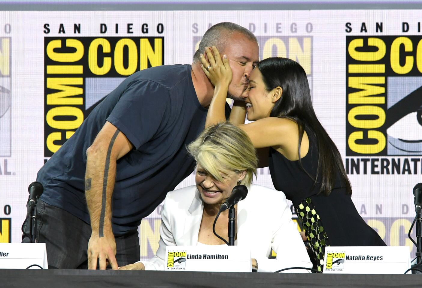 From left, Tim Miller, Linda Hamilton and Natalia Reyes at the "Terminator: Dark Fate" panel at Comic-Con International.