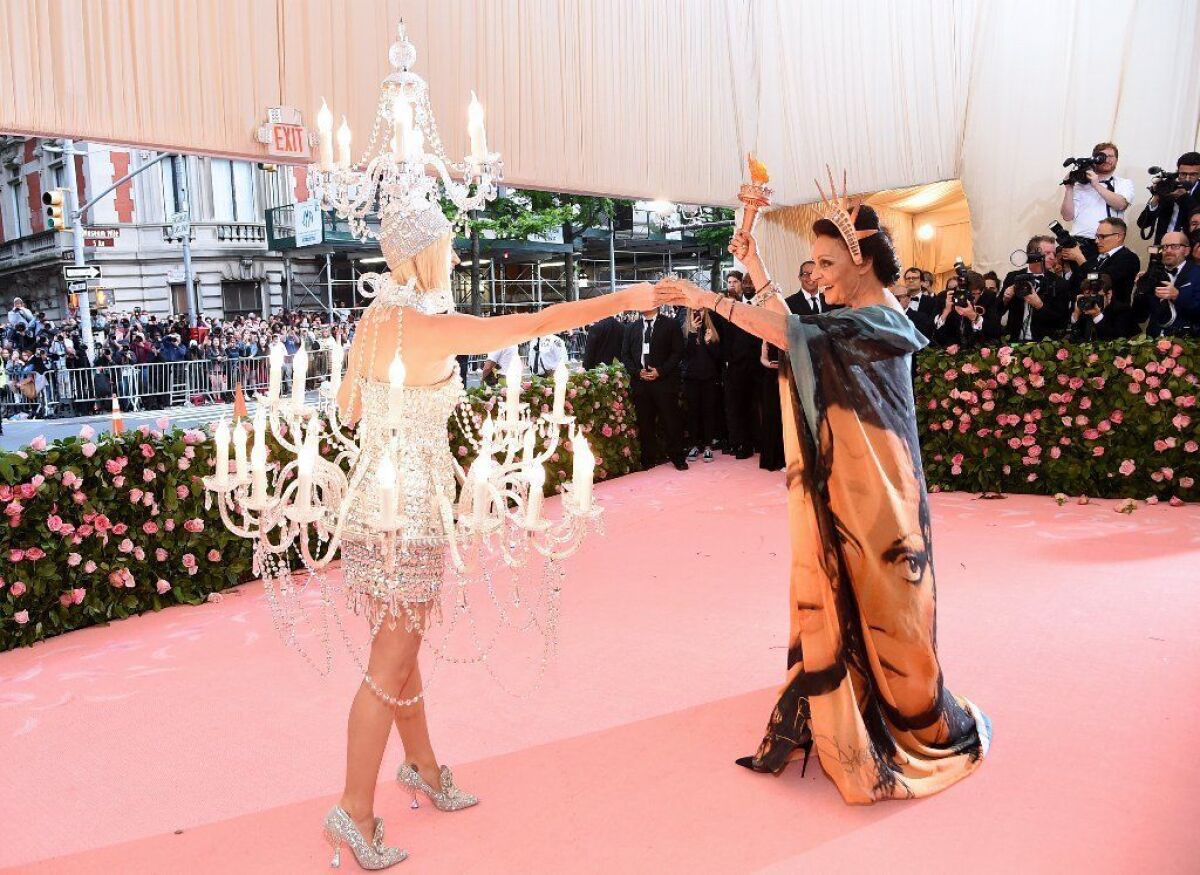 Katy Perry, left, and Diane von Furstenberg on the Met Gala red carpet.