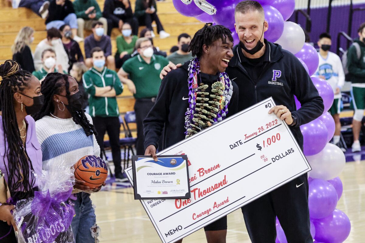 Makai Brown is presented an award.