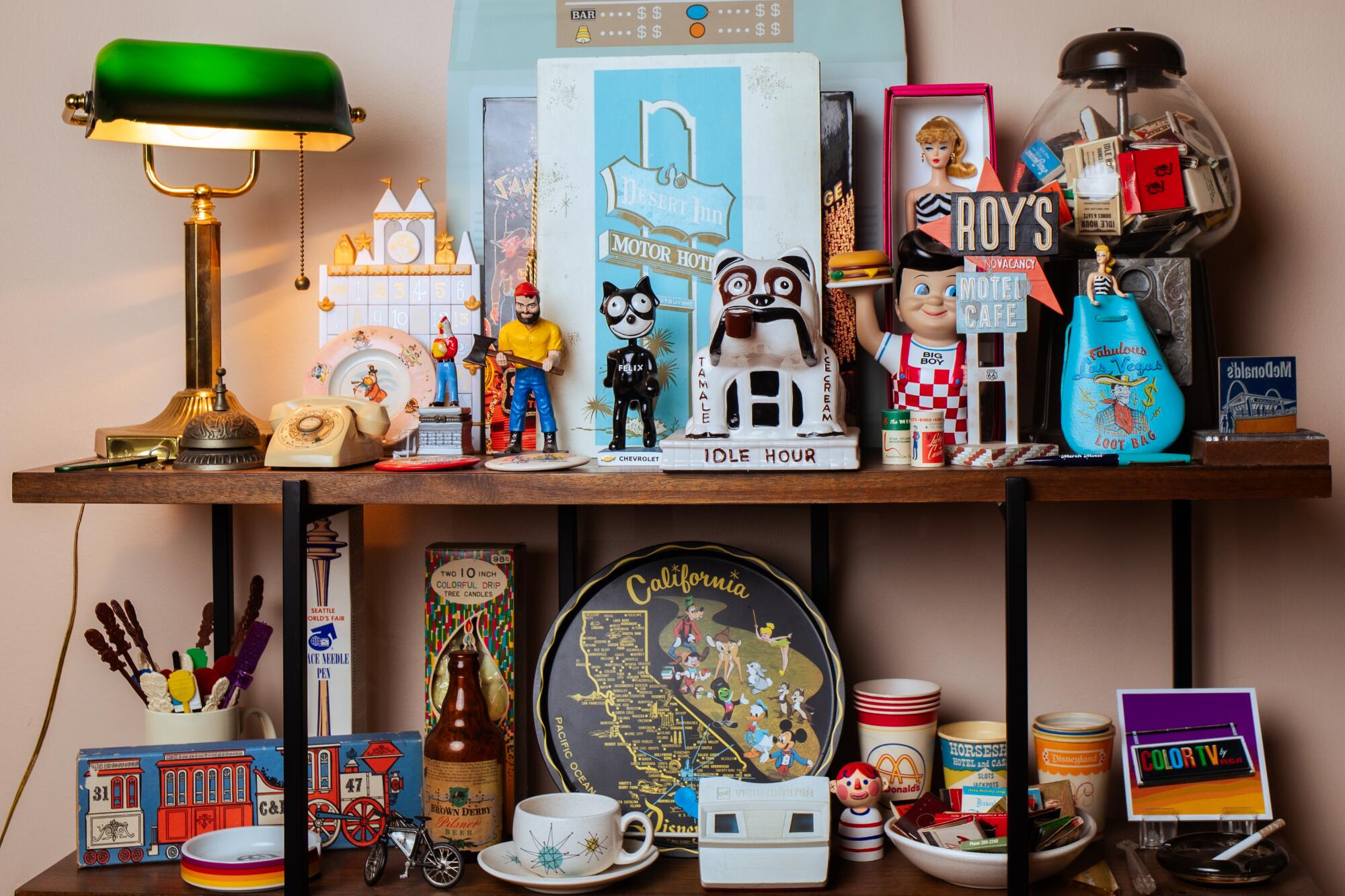 Vintage collectibles connected show astatine Msrlyan's location observe iconic L.A. businesses similar Idle Hour and Bob's Big Boy.