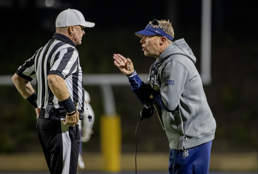 St. John Bosco High football coach Jason Negro argues a call with an official.
