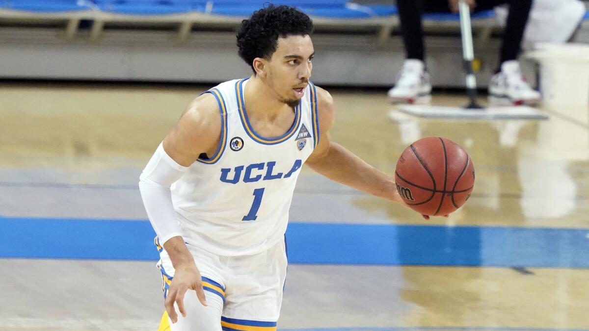 UCLA guard Jules Bernard dribbles during a game against Colorado on Jan. 2.