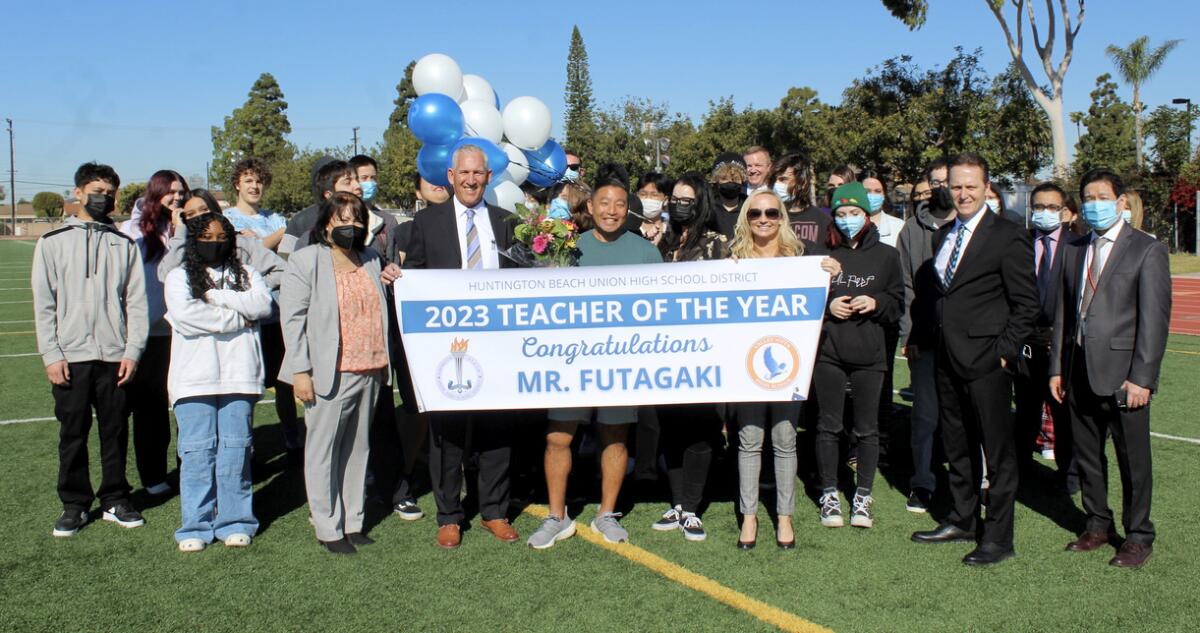 Brandon Futagaki, center, is in his 17th year as a teacher at Valley View High School in Fountain Valley.