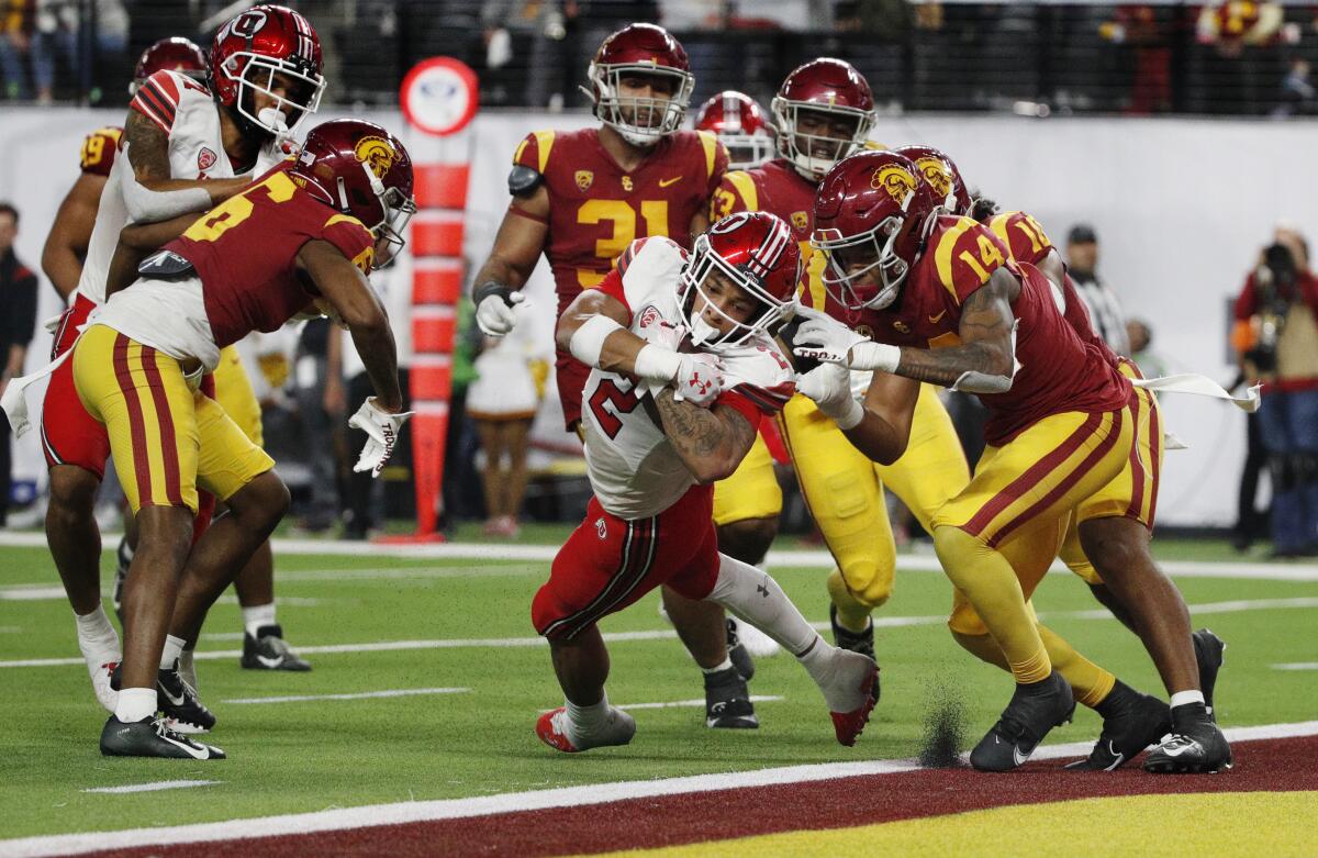 Utah running back Micah Bernard scores a touchdown in the fourth quarter to seal a 47-24 win over USC.