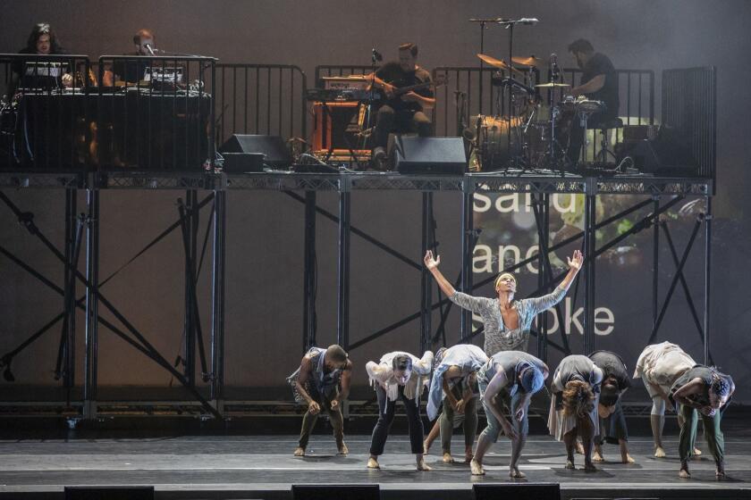 HOLLYWOOD, CALIF. -- SUNDAY, AUGUST 5, 2018: Bon Iver performs with dance company members of TU Dance, at the Hollywood Bowl in Hollywood, Calif., on Aug. 5, 2018. (Allen J. Schaben / Los Angeles Times)