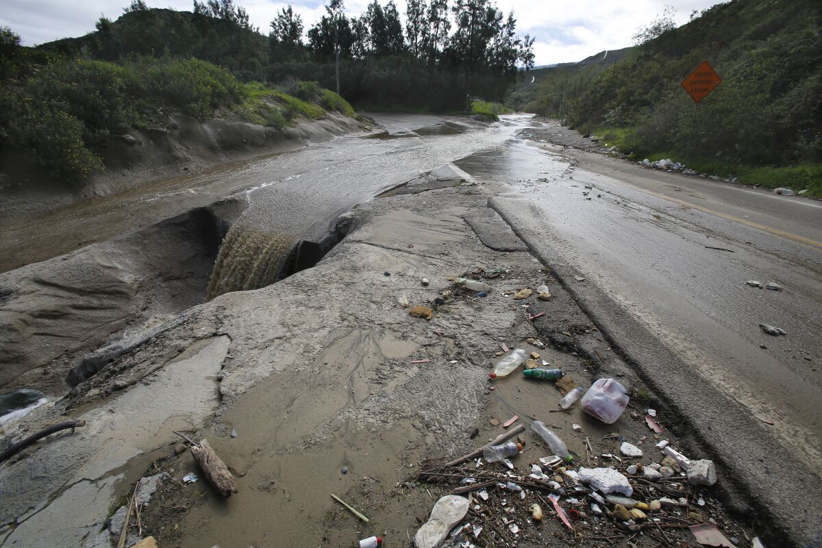 The photo taken back in February shows the water run off along the U.S. border on Monument Road that carries trash debris believed to originate in Mexico that ends up in the Tijuana River Valley in the U.S.