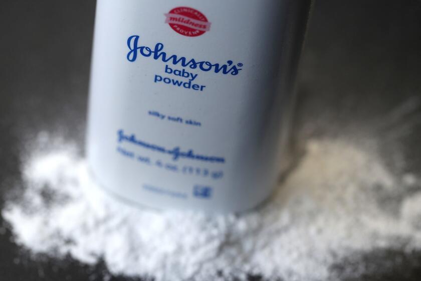 FILE - DECEMBER 18. 2018: A report released by Reuters claims that Johnson & Johnson knew for decades that its baby powder sometimes contained asbestos and failed to alert authorities December 18, 2018. SAN FRANCISCO, CA - JULY 13: In this photo illustration, a container of Johnson's baby powder made by Johnson and Johnson sits on a table on July 13, 2018 in San Francisco, California. A Missouri jury has ordered pharmaceutical company Johnson and Johnson to pay $4.69 billion in damages to 22 women who claim that they got ovarian cancer from Johnson's baby powder. (Photo by Justin Sullivan/Getty Images) ** OUTS - ELSENT, FPG, CM - OUTS * NM, PH, VA if sourced by CT, LA or MoD **