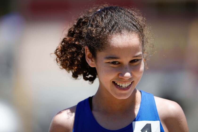 San Diego, CA - May 18: Eastlake's Jaelyn Williams smiles after winning the 1600 meter run during the CIF San Diego Section Track and Field Championships at Mt. Carmel High School on Saturday, May 18, 2024 in San Diego, CA. (Meg McLaughlin / The San Diego Union-Tribune)
