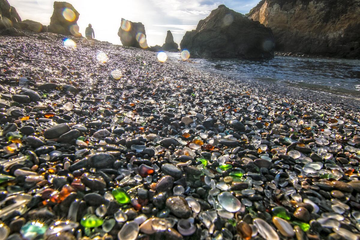 Ocean-worn debris known as sea glass sparkles in the sun.