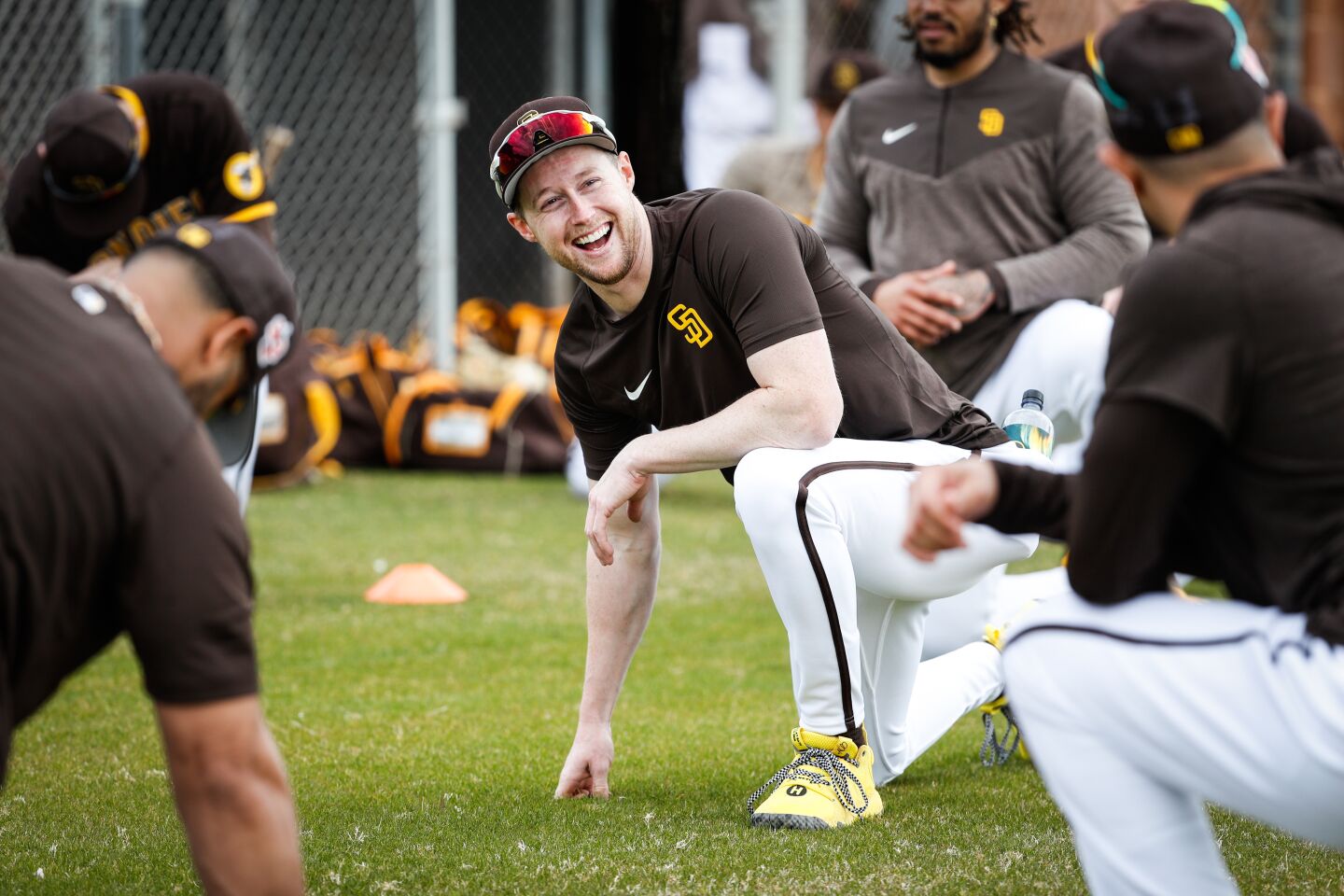 Padres second baseman Jake Cronenworth (9) laughs during a spring training practice at the Peoria Sports Complex on Tuesday, Feb. 21, 2023 in Peoria, AZ.