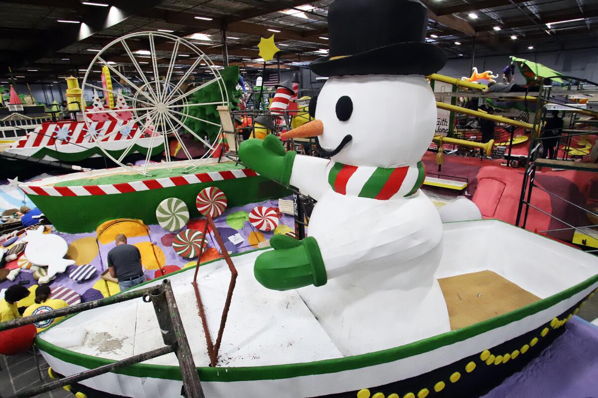 Frosty the Snowman in a boat is one of the pieces of Newport Beach's first float since 2006.
