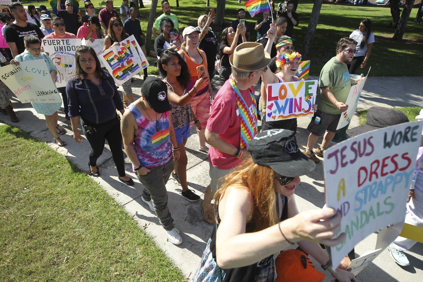 Protesters in support of the Drag Queen Story Hour march toward the Chula Vista Public Library, Civic Center Branch, to counter a group of protesters against the Story Hour on Tuesday, September 10, 2019 in Chula Vista, California.