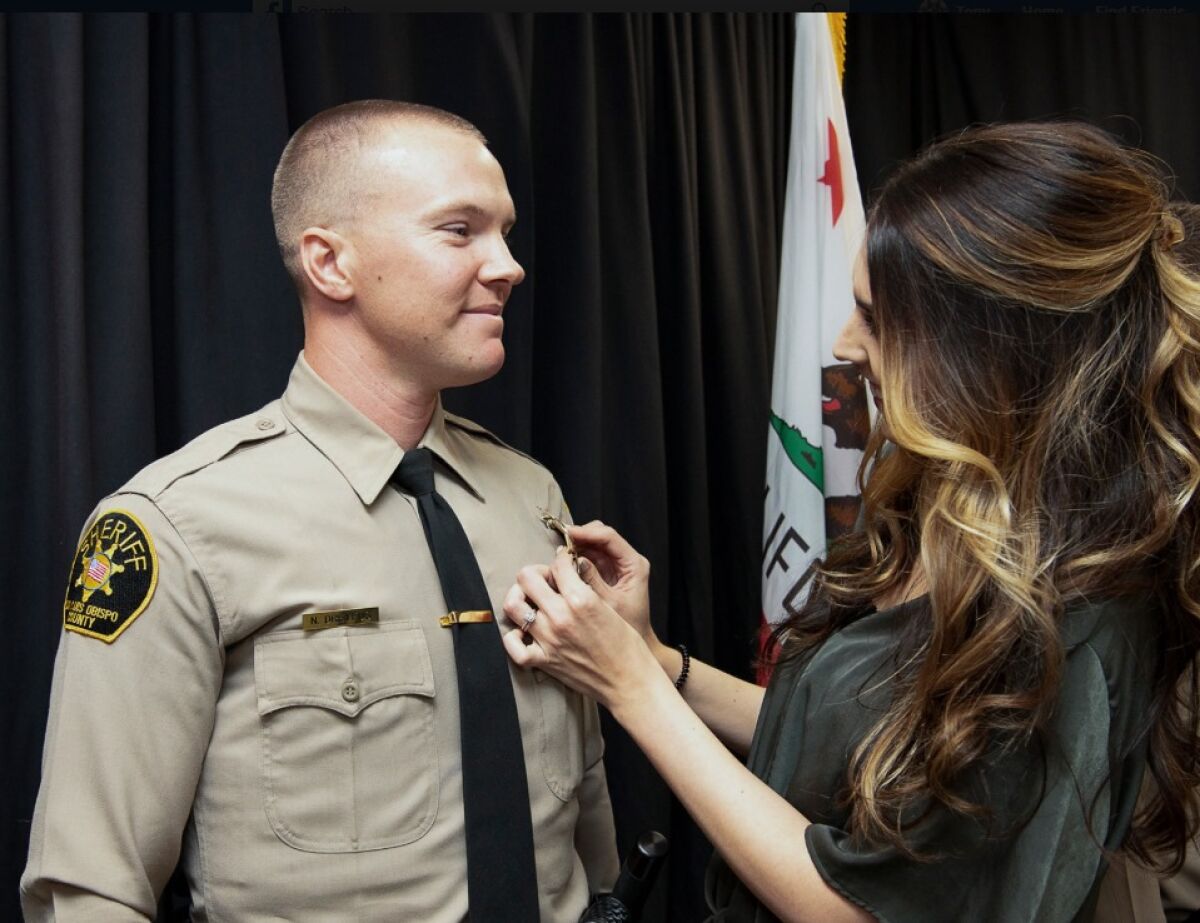 The deputy injured in the shooting at the Paso Robles police station was identified as Nicholas Dreyfus, 28.