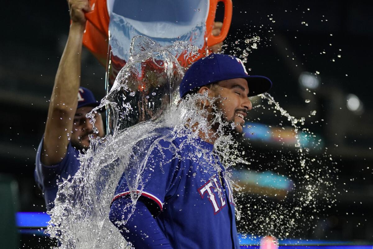 Grant Anderson wins in relief in MLB debut, Rangers beat Tigers 10