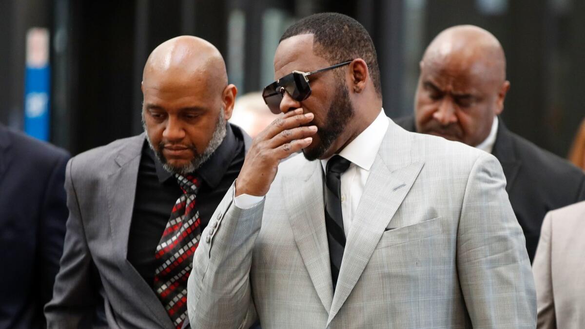 R. Kelly arrives for court