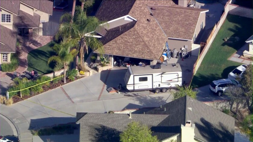 An aerial shot shows a home in Santa Clarita.