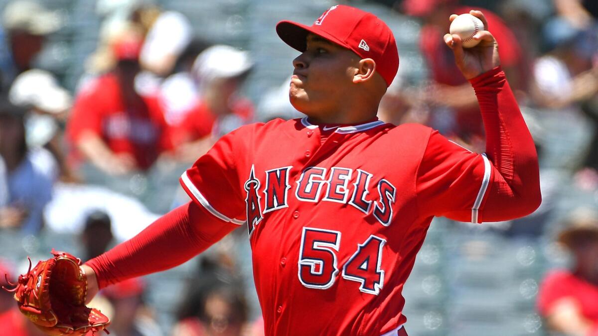 Angels starter Jose Suarez held the Seattle Mariners to four hits and two runs in 4 2/3 innings Sunday.
