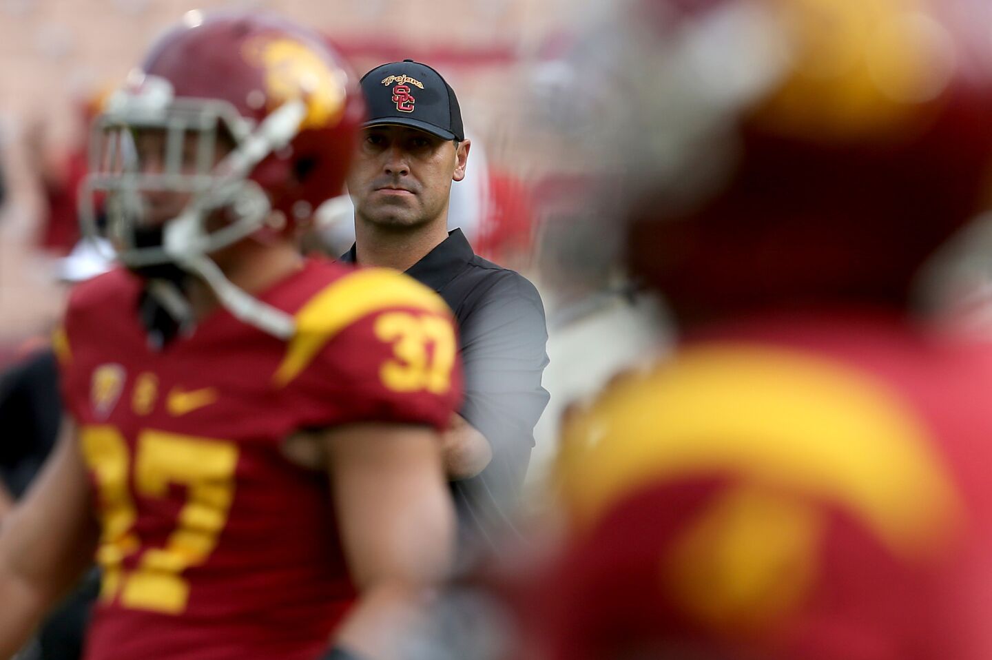 USC Coach Steve Sarkisian watches his Trojans squad warm-up before the game against Idaho on Sept. 12, 2015.