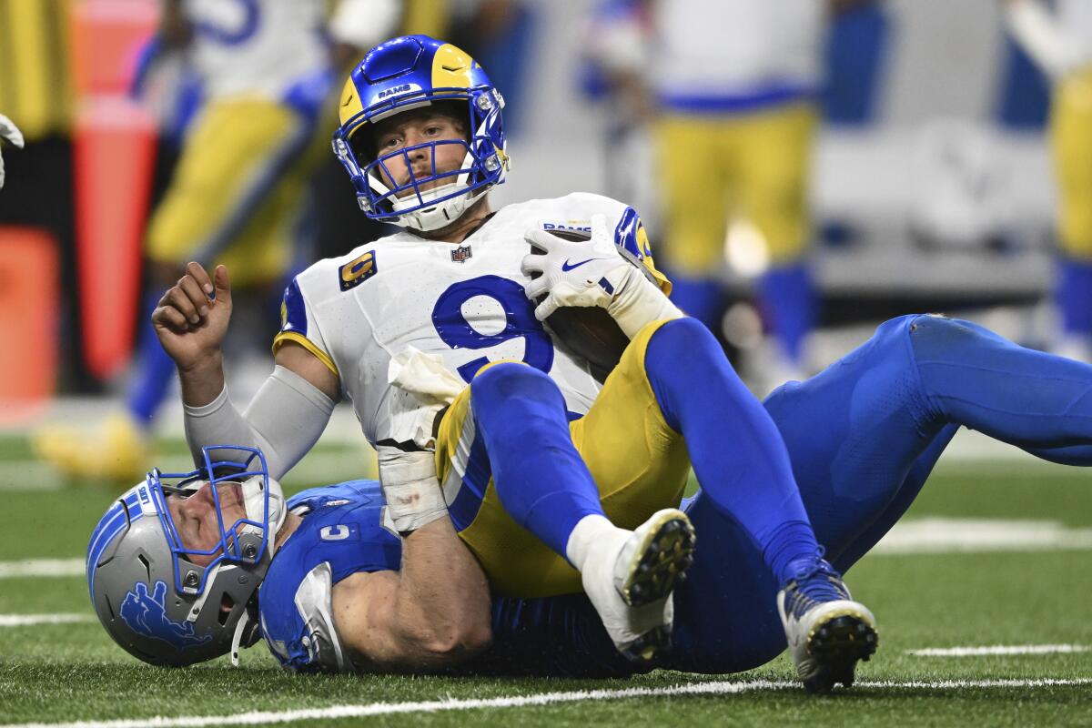 Detroit Lions defensive end Aidan Hutchinson sacks Rams quarterback Matthew Stafford.