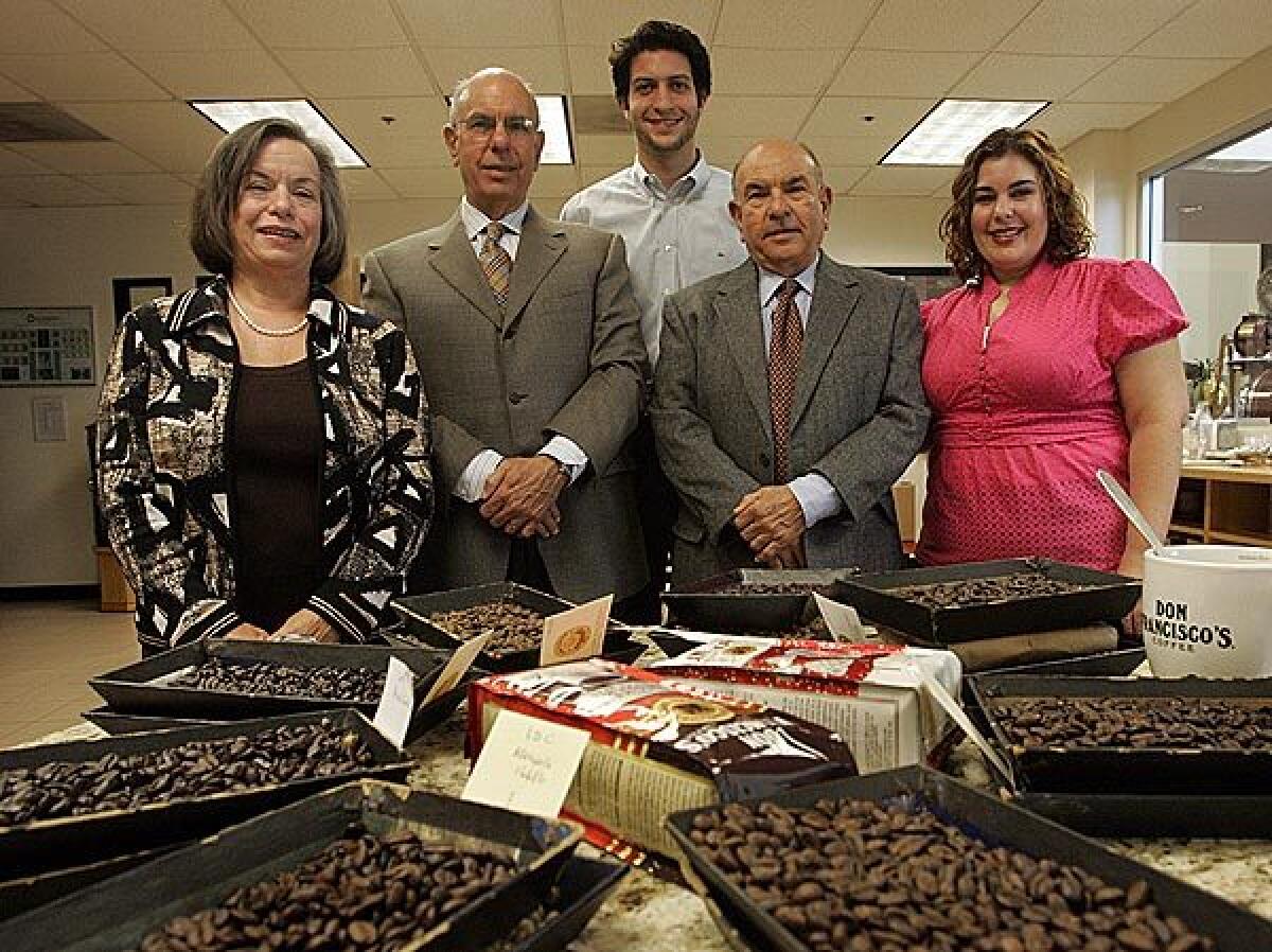 Members of the Gavina clan, from left, Leonor Gavina-Valls, Pedro Gavina, Michael Gavina (in back), Jose Gavina and Lilly Gavina are in the coffee tasting room in the Vernon plant. F. Gavina & Sons Inc. coffee roasters started in Vernon in 1967 and produces more than 36 million pounds of roasted coffee a year.
