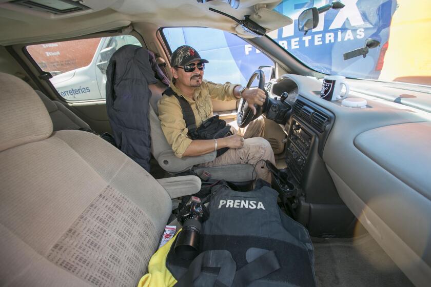 Tijuana "fixer" Margarito Martinez, a photographer himself helps visiting photojournalists and reporters to navigate the complexities of Tijuana. He was photographed in Tijuana on Thursday, October 3, 019.