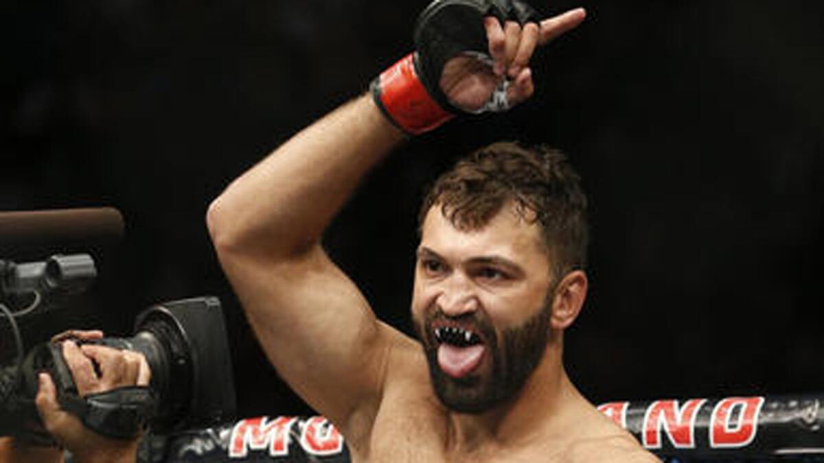 Andrei Arlovski gestures before fighting Frank Mir in a heavyweight mixed martial arts bout at UFC 191 on Sept. 5 in Las Vegas.