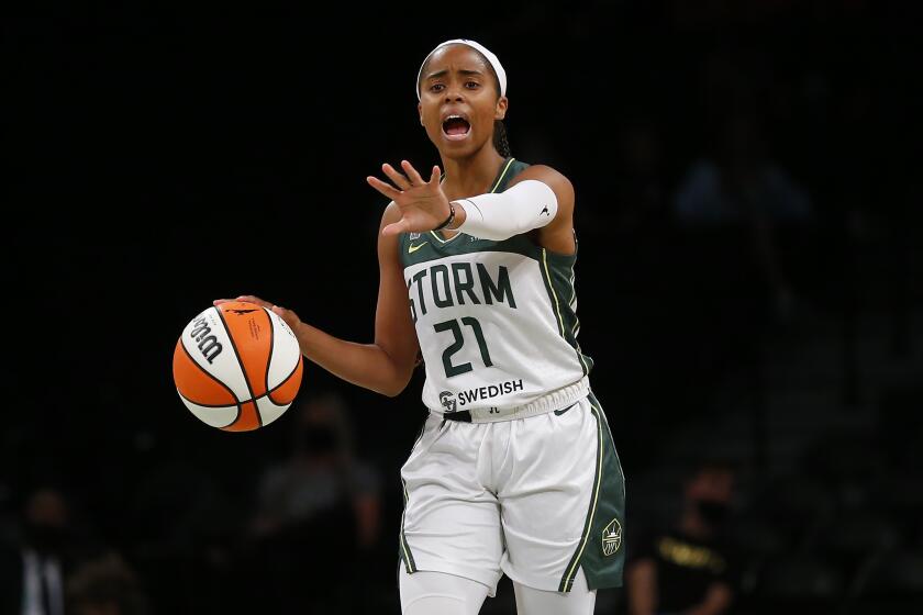 Seattle Storm guard Jordin Canada (21) dribbles the ball against the New York Liberty during the first half of a basketball game Wednesday, Aug. 18, 2021, in New York. (AP Photo/Noah K. Murray)