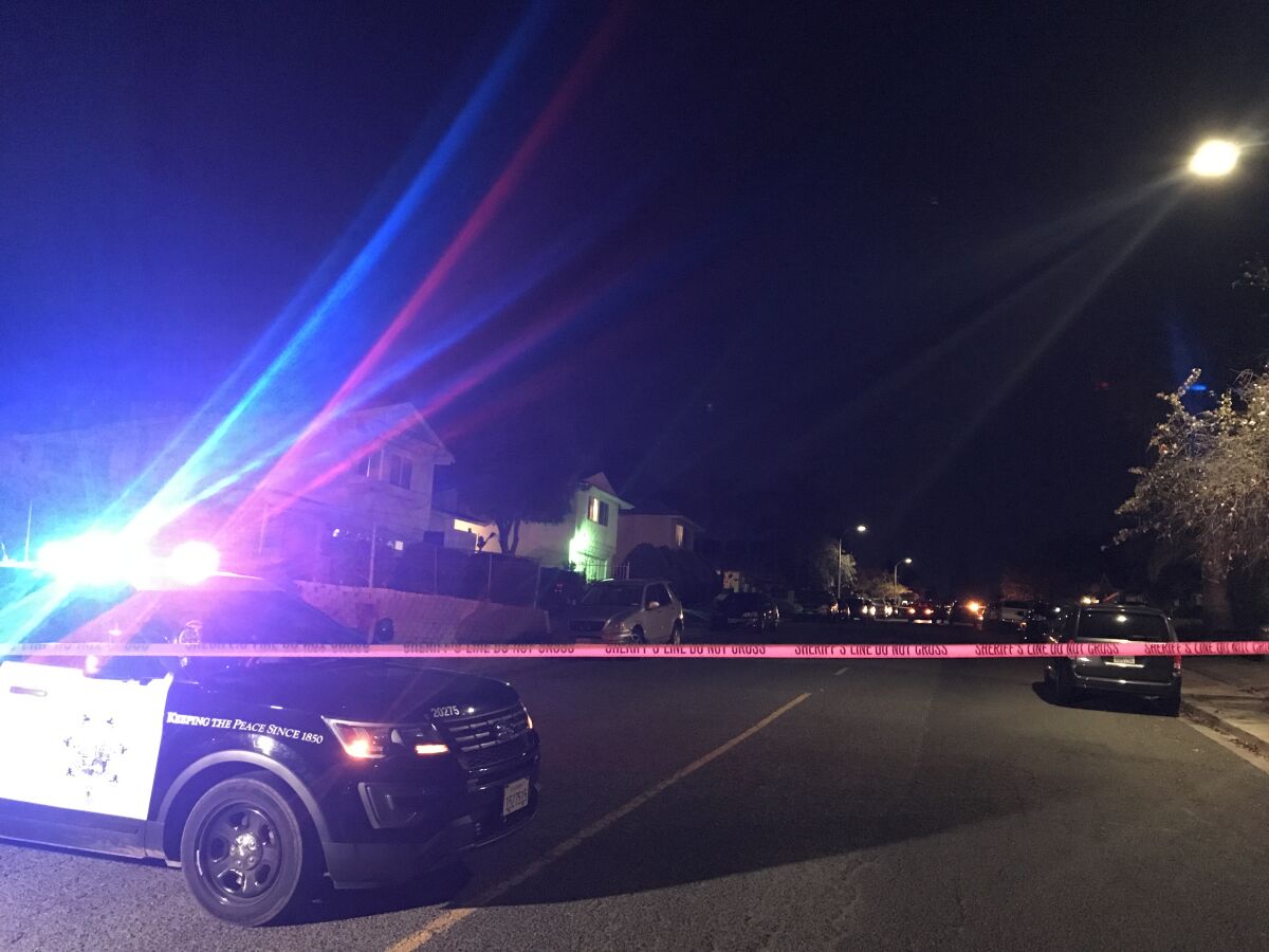 Crime scene tape was set up Monday night across Camino De Las Palmas at Ildica Street after at least one deputy opened fire and shot a reportedly suicidal man.