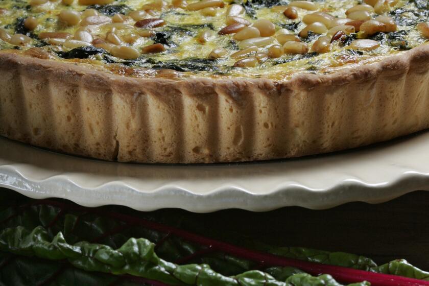 Chard leaves in a saffron-spiked filling with Parmesan and pine nuts. Recipe: Chard and saffron tart