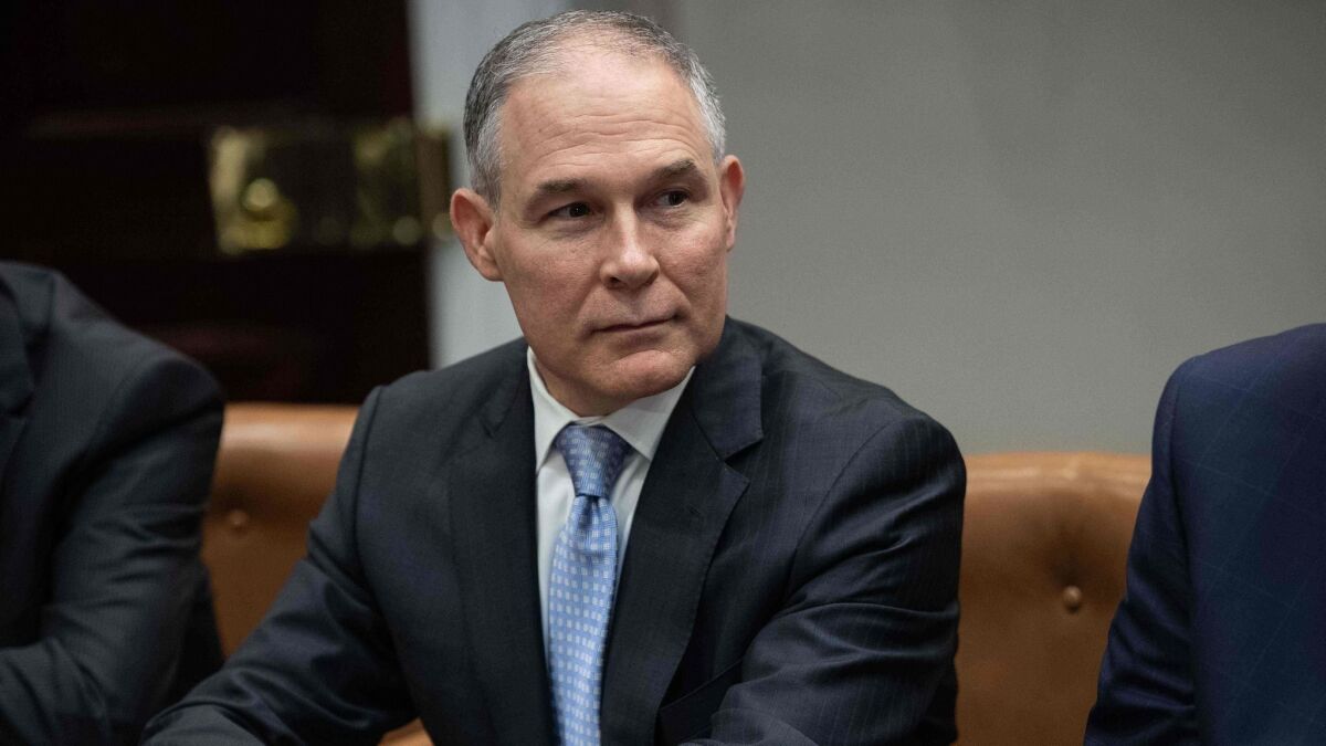 Then-EPA Administrator Scott Pruitt attends a meeting at the White House in May.