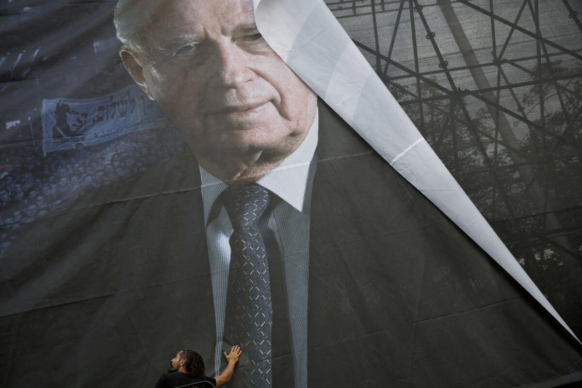 A portrait of late Israeli Prime Minister Yitzhak Rabin in Tel Aviv, Israel on Oct. 28. In 1995, Rabin was assassinated by a right-wing Israeli minutes after attending a festive peace rally.