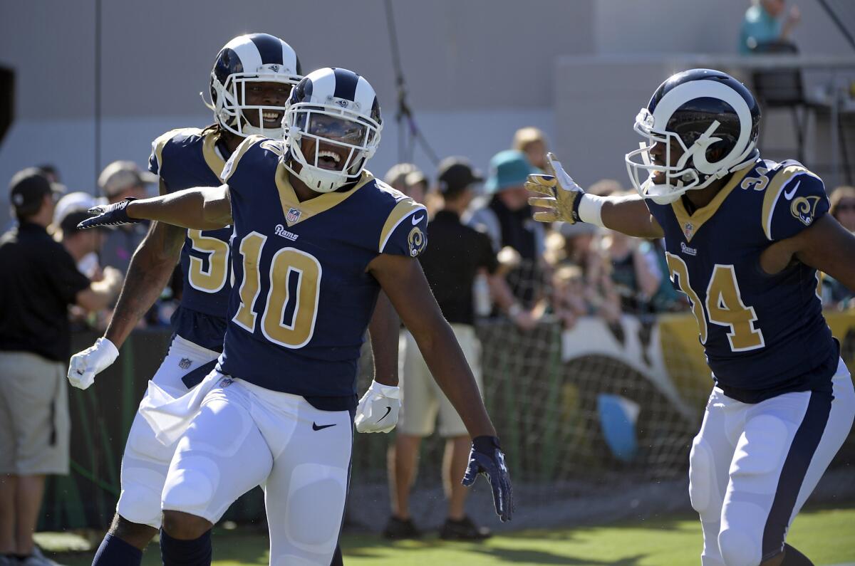 Pharoh Cooper (10) celebrates a 103-yard kickoff return for a touchdown against the Jacksonville Jaguars.