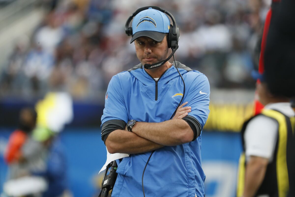 Chargers head coach Brandon Staley watches from the sideline.