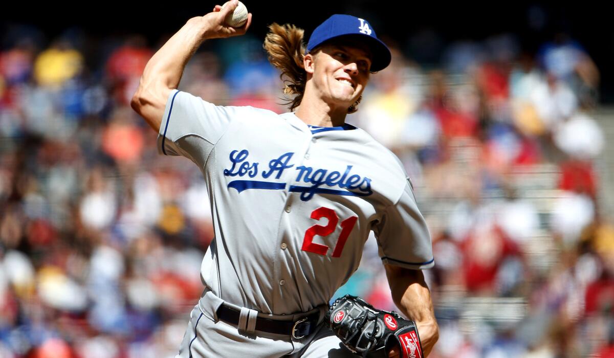 Dodgers starter Zack Greinke pitched seven shutout innings against the Diamondbacks on Sunday at Chase Field.