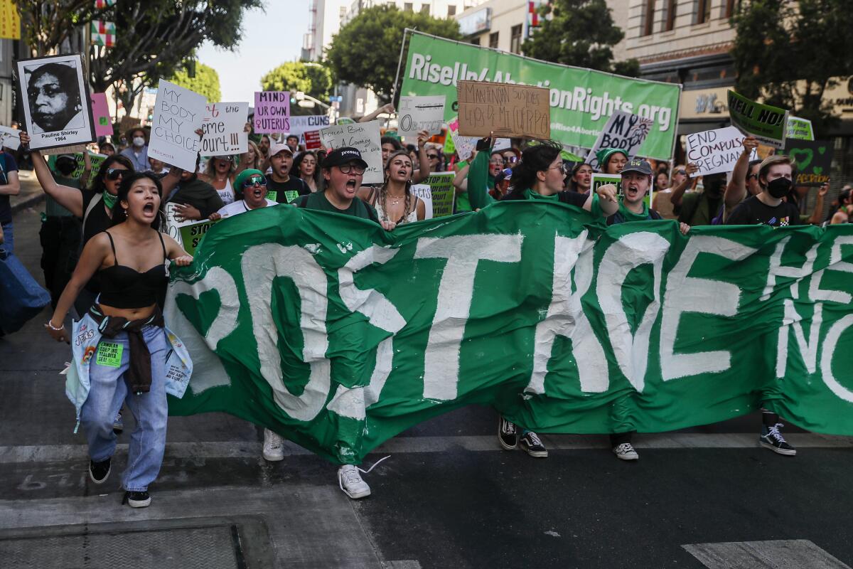 Abortion rights supporters rally in downtown Los Angeles after the Supreme Court overturned Roe vs. Wade on June 27, 2022.