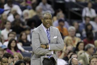 Charlotte Bobcats head coach Paul Silas looks on during the first half of an NBA basketball game against the Boston Celtics in Charlotte, N.C., Sunday, April 15, 2012. (AP Photo/Chuck Burton)