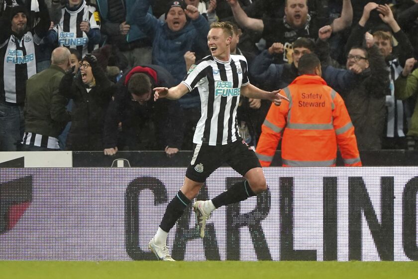 Newcastle United's Sean Longstaff celebrates scoring their side's second goal of the game during their English League Cup Semi Final second leg soccer match against Southampton at St. James's Park, Newcastle upon Tyne, England, Tuesday, Jan. 31, 2023. (Owen Humphreys/PA via AP)