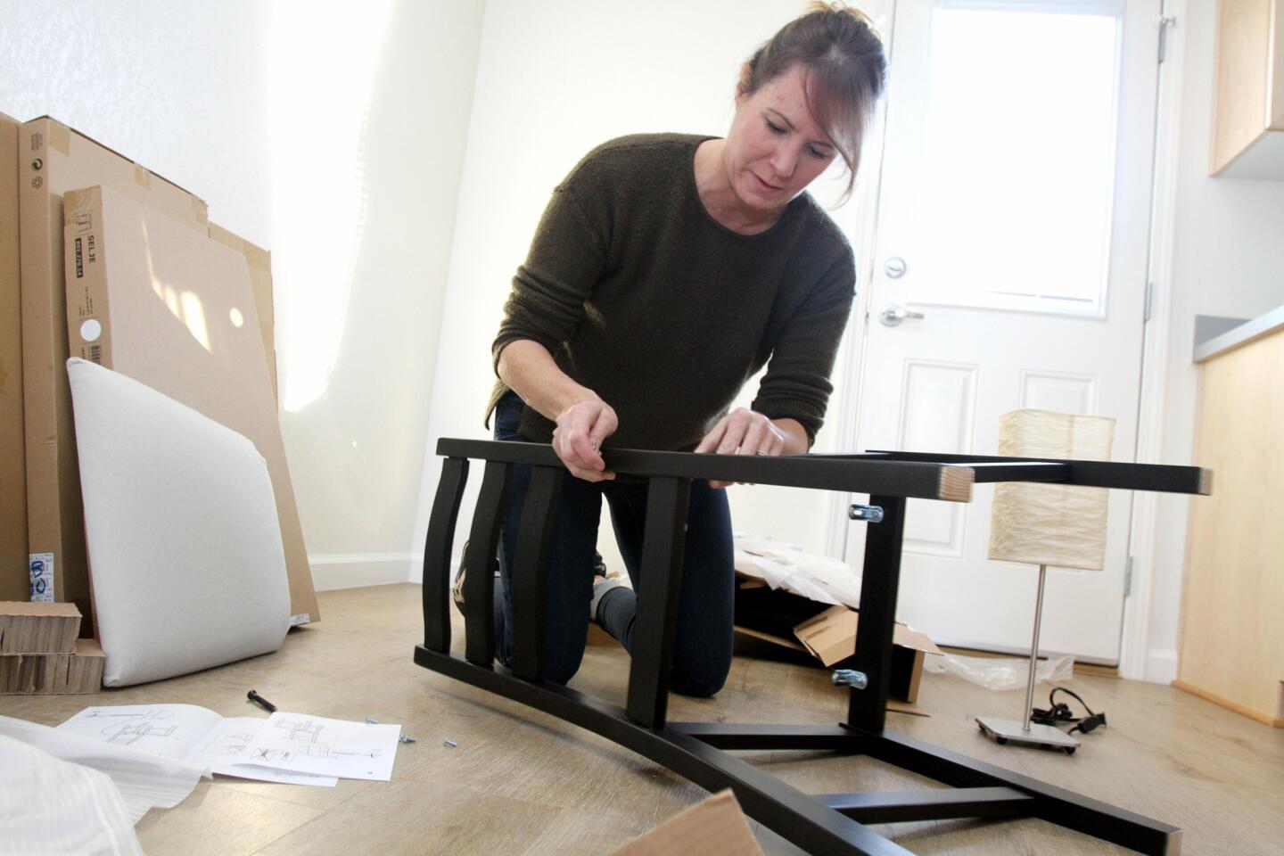 Photo Gallery: Volunteers help build furniture for Veterans' bungalows