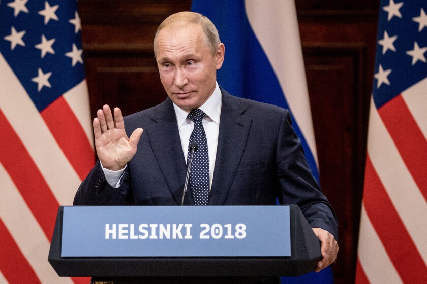 Russian President Vladimir Putin answer questions during a joint press conference with U.S. President Donald Trump after their summit on July 16, 2018 in Helsinki, Finland. The two leaders met one-on-one and discussed a range of issues including the 2016 U.S Election collusion.