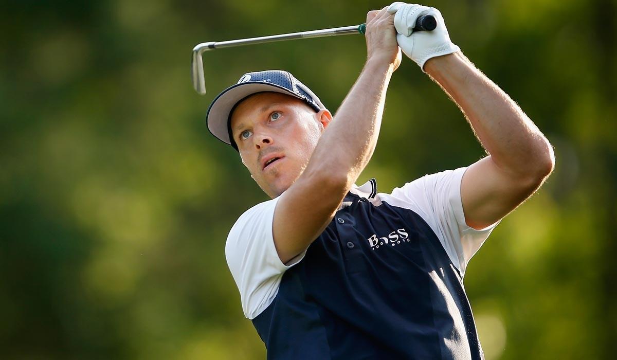 Ben Crane watches his tee shot on the fourth hole during the first round of the FedEx St. Jude Classic at the TPC Southwind on Thursday.