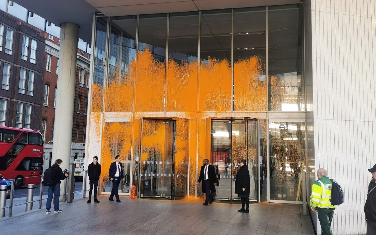 Protesters from Just Stop Oil sprayed orange paint on the facade of London's News Corp.