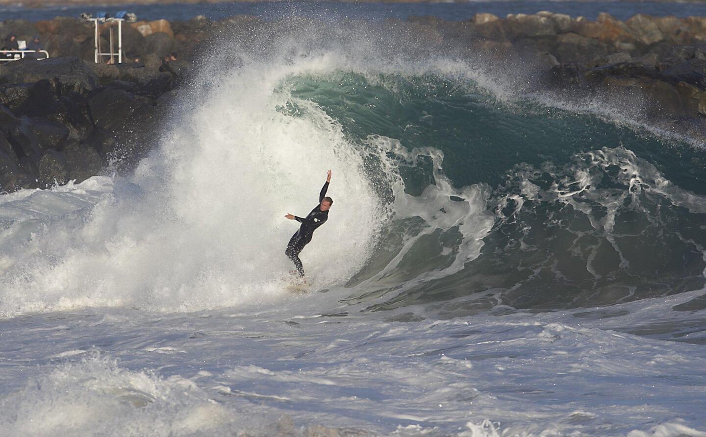 Photo Gallery: Surf reaches up to 12 feet at the Wedge