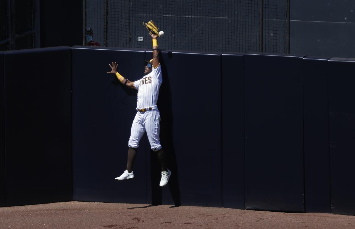 Padres center fielder Jorge Mateo can't make the catch on a two-run homer by the San Francisco Giants' Darin Ruf.